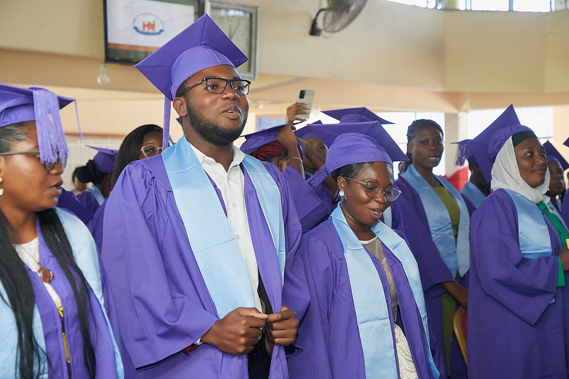 Group of successful graduates celebrating